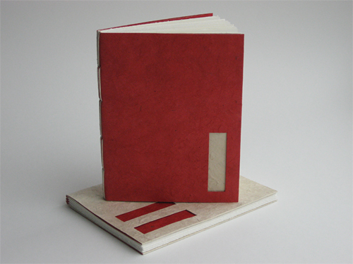 Matching books: red and white on top of white and red