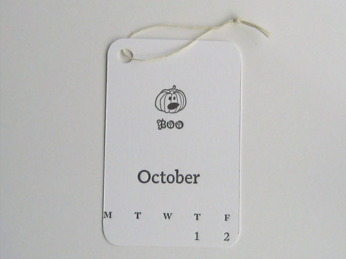 Gift card: Letterpress pumpkin face saying 'boo'