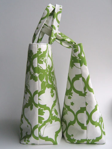 Side shot of two bags - green and white lattice fabric