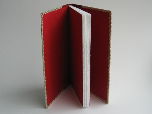 Open cover view: red end papers