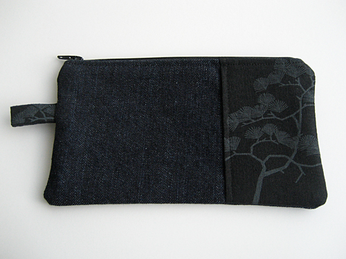 Denim pencil case with a patch of black and charcoal bonsai screen-printed fabric