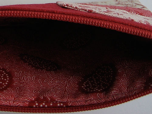 Lining detail of red zipper pouch