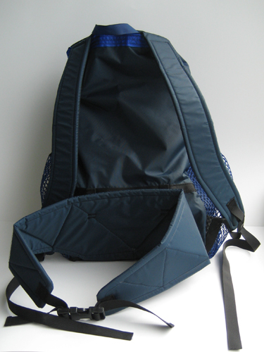 Back view of the backpack, showing details of shoulder straps and hip belt.
