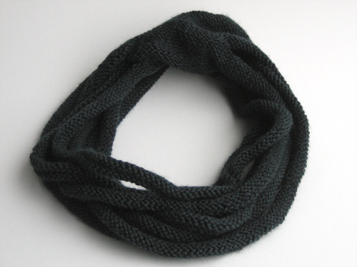Cowl of seven knitted circlets attached in the back