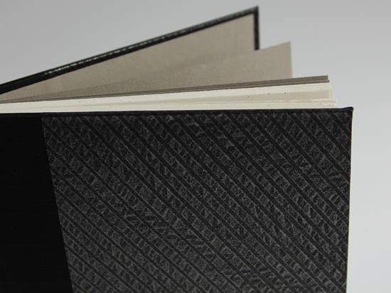 Book cover with black and silver paste paper cover